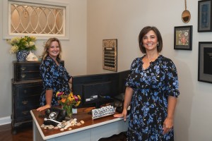 Staff smiling at front desk